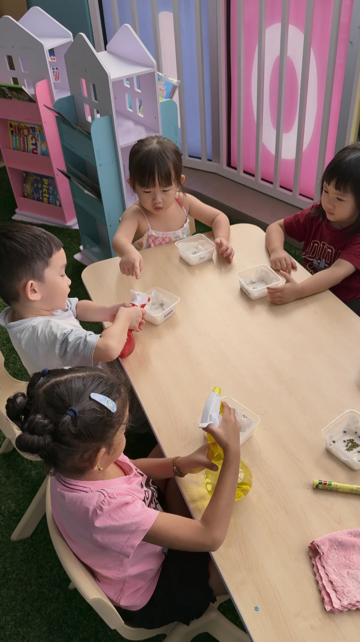 Children participating together in a garden activity